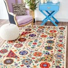 Machine weaving carpets